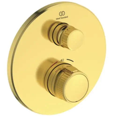 Brausethermostat mit zwei verstellbaren Reglern auf runder Platte in Gold. Auf der Oberkante ist das Logo von Ideal Standard sichtbar.